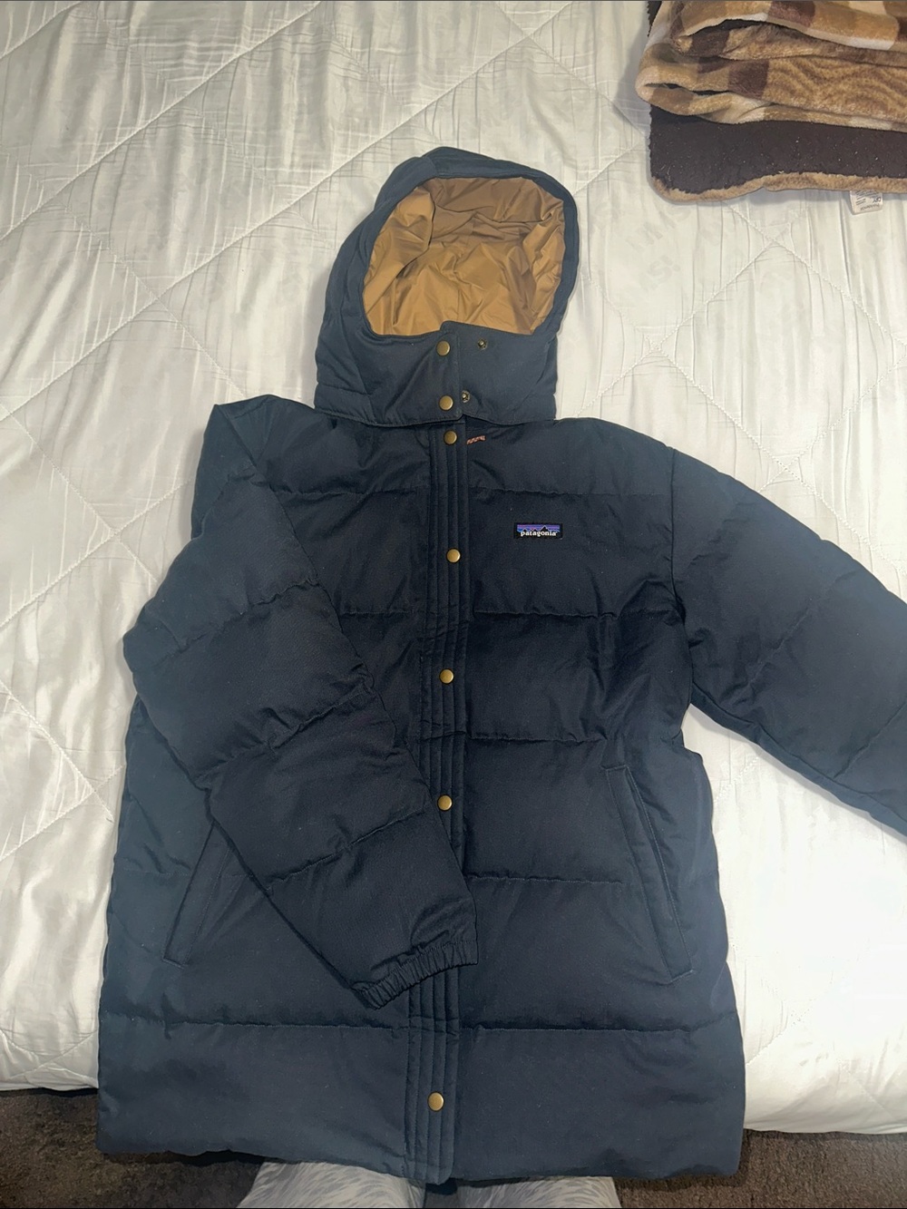 Patagonia Women's Dark Navy Puffer Jacket with Tan Hood Lining